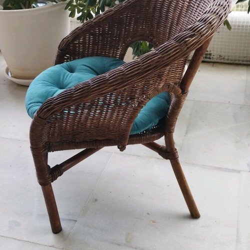 Bamboo children's armchair like new with petrol and red cushions