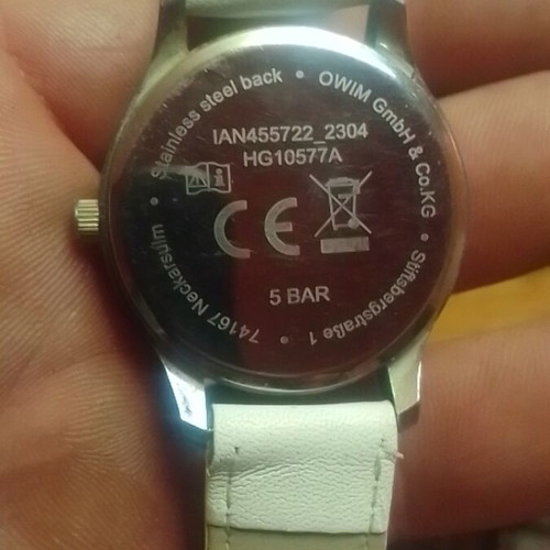 Wristwatch women's new with white strap and quartz mechanism