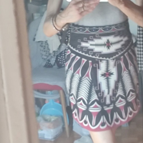Peace And Chaos mini skirt like new, tribal design, sizes S/M