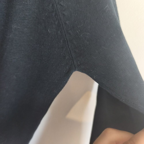 Black thin knit women's sweater with V-neck and long sleeves