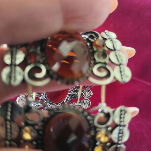 Vintage cuff bracelet with large brown stones and decorative details