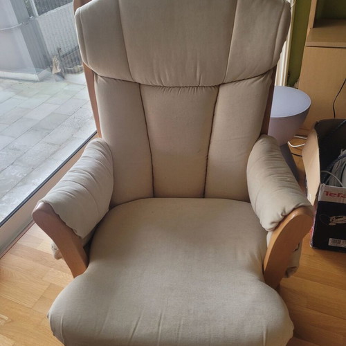 Dutailier nursing rocking chair used with footstool and throw