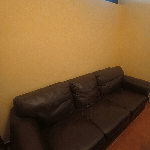 Three-seater leather sofa used