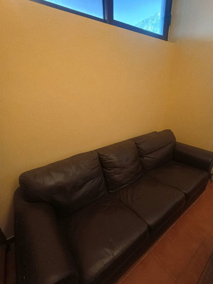 Three-seater leather sofa used