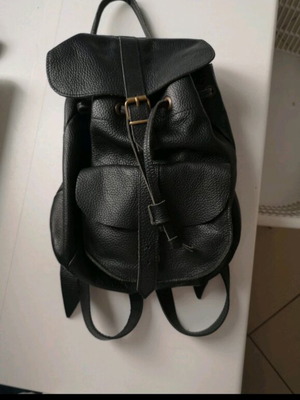 Black leather backpack bag like new with suede interior