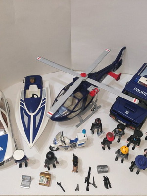 Playmobil police set with helicopter, 2 cars, motorcycle, boat and 11 figures like new