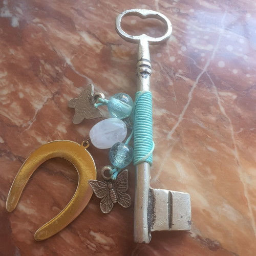 Lucky key charm with horseshoe