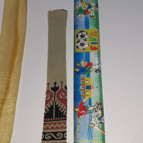 Handmade bookmark with embroidered pattern in black and ecru