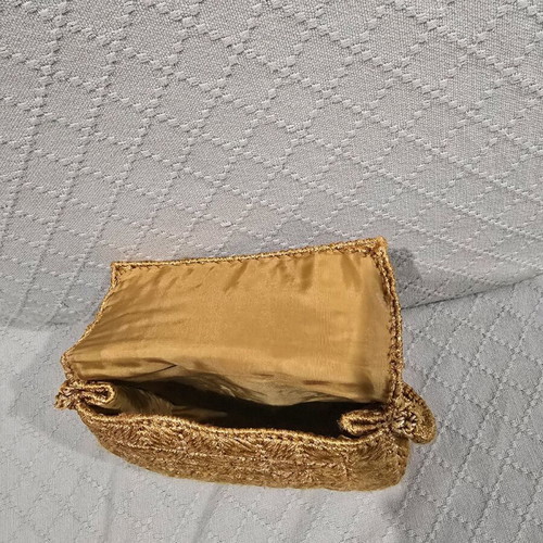 Women's handheld evening bag handmade from gold thread like new