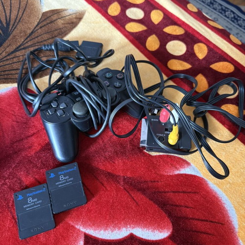 PlayStation 2 modified console used with original Sony controller and memory cards