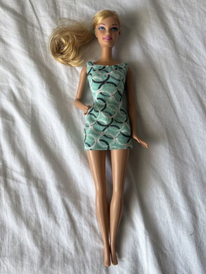 Barbie doll with blue dress