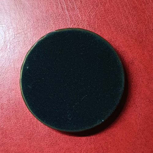 Collectible metal paperweight with Vergina Sun used