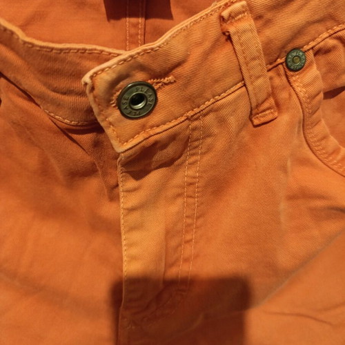 Please Italian orange jeans size M used