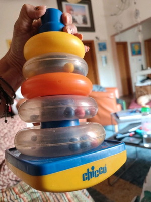Baby toy used with scratches and missing one ring