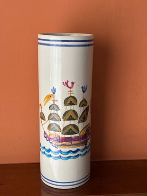 Ceramic vase used with sea theme by artist Tolis
