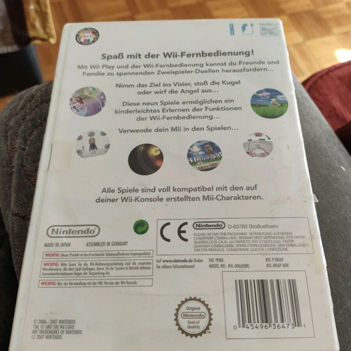 Wii Play game for Nintendo in German with torn plastic wrap