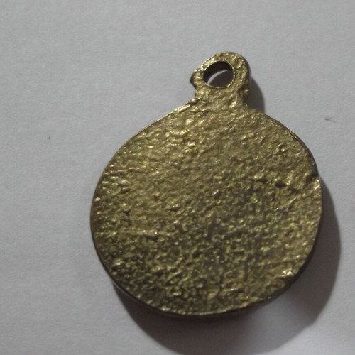 Metal pendant Sun of Vergina used, gold tone
