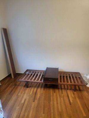Wooden solid sofa bed used with nightstand