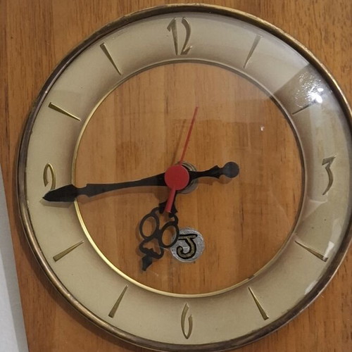Mid-Century Modern wall clock like new with rope and wood