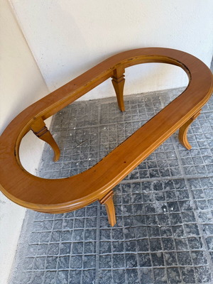 Wooden coffee table used in classic style with sturdy construction