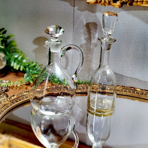 Vintage French glass cruet set for oil and vinegar with ground stoppers