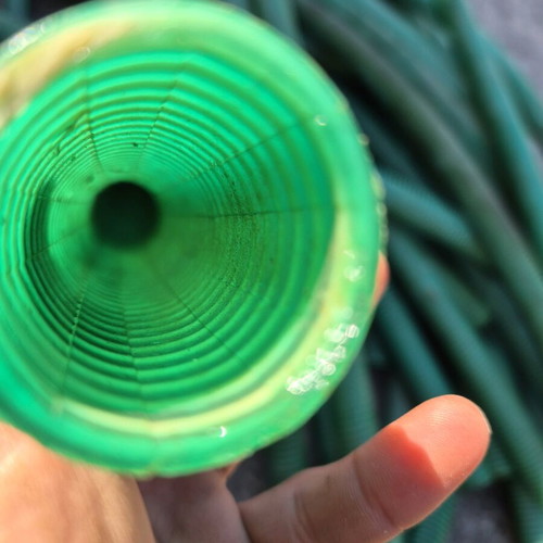 Spiral watering hoses like new, set of 36, 1.20-1.60m length