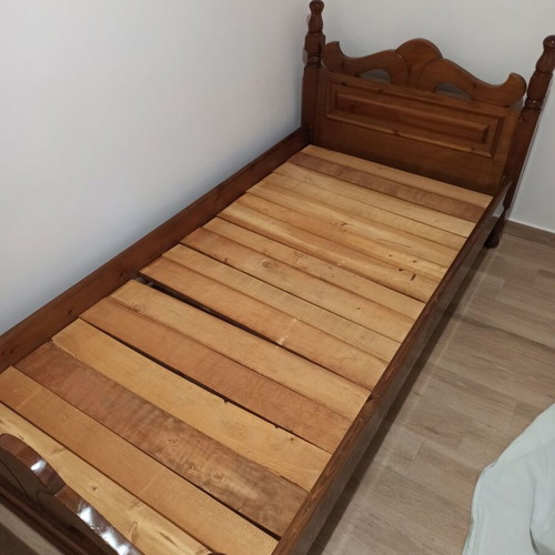 Wooden bed used, 2 meters long, 1 meter wide