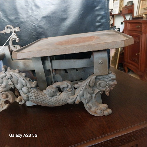 Cast iron antique scale used with lion and dragon decorations