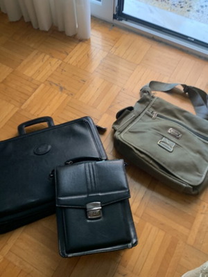 Laptop bags and men's pouches used, black