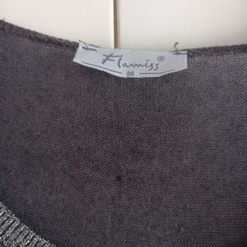 Women's Blousedress like new with silver details on sleeves and bust