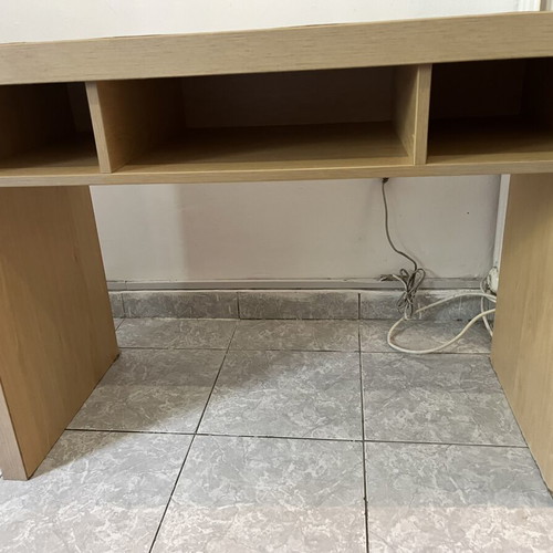 Desk with shelves used, beige color, sturdy hotel equipment