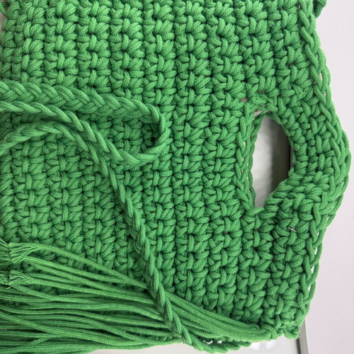 Handmade green crochet bag with fringes