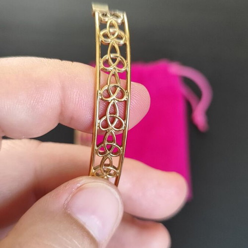 Gold stainless steel bracelet with unique design like new