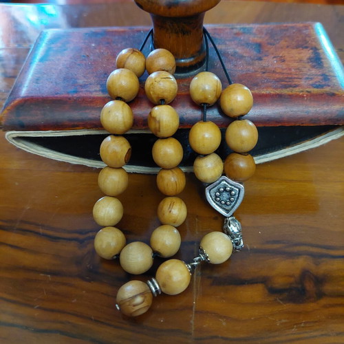 Komboloi from olive wood new, 21+3 beads with metal decorations