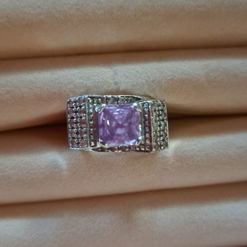 Silver platinum-plated ring with engraving and pink transparent stone like new