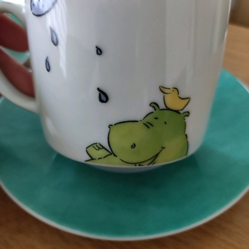 Set of 2 coffee cups with saucers like new, turquoise with hippopotamus