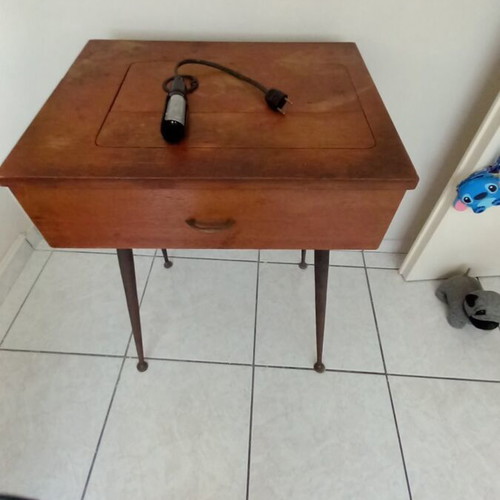 Singer sewing machine used with table