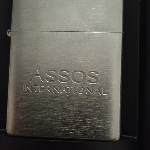 Zippo Assos International lighter like new, made in USA, brushed chrome