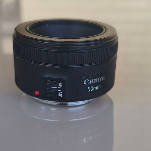 Canon EF 50mm f/1.8 STM lens with hood