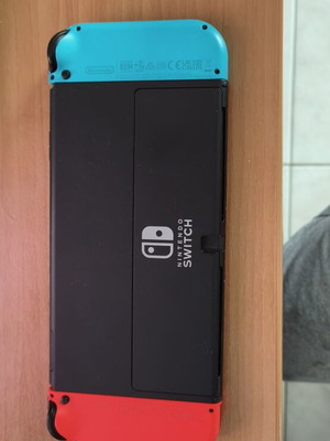 Nintendo Switch OLED console blue and red
