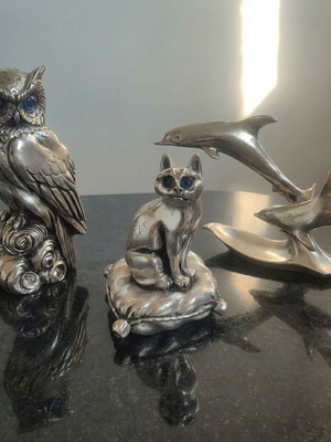 Silver figurines used, owl, cat and dolphins set