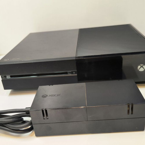 Microsoft Xbox One console with power supply for repair or parts, used
