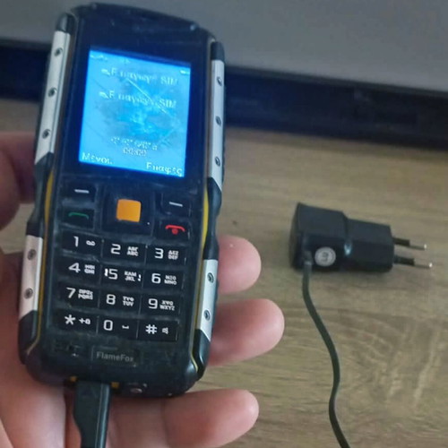 Flame Fox mobile phone used with long-lasting battery and charger