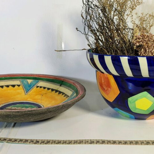 Mexican style ceramic plate and vase with plant composition used