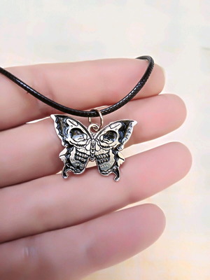 Butterfly pendant new, silver with black skulls