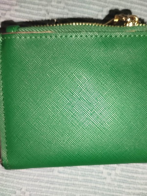Small green wallet used