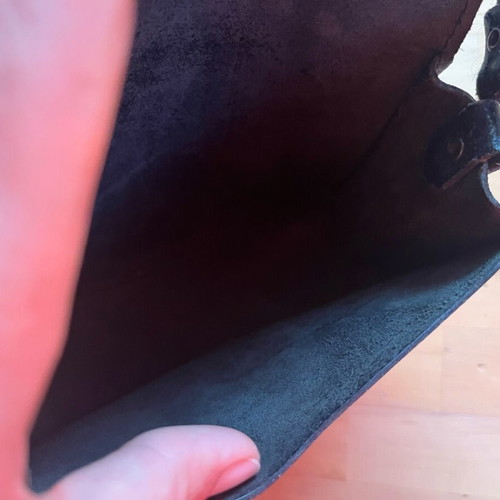 Black leather crossbody bag used