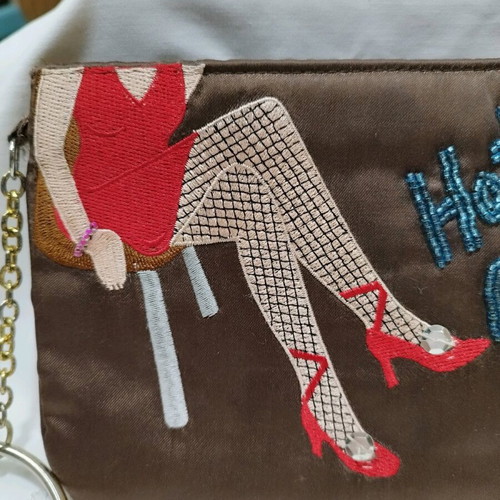 Vintage embroidered handbag used with retro design