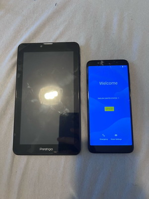 Alcatel 5058i phone used with cracked screen and Prestigio tablet