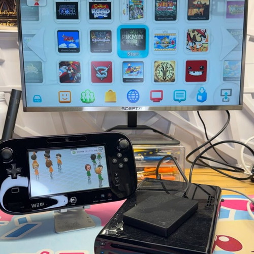 Nintendo Wii U console like new with external hard disc and many games